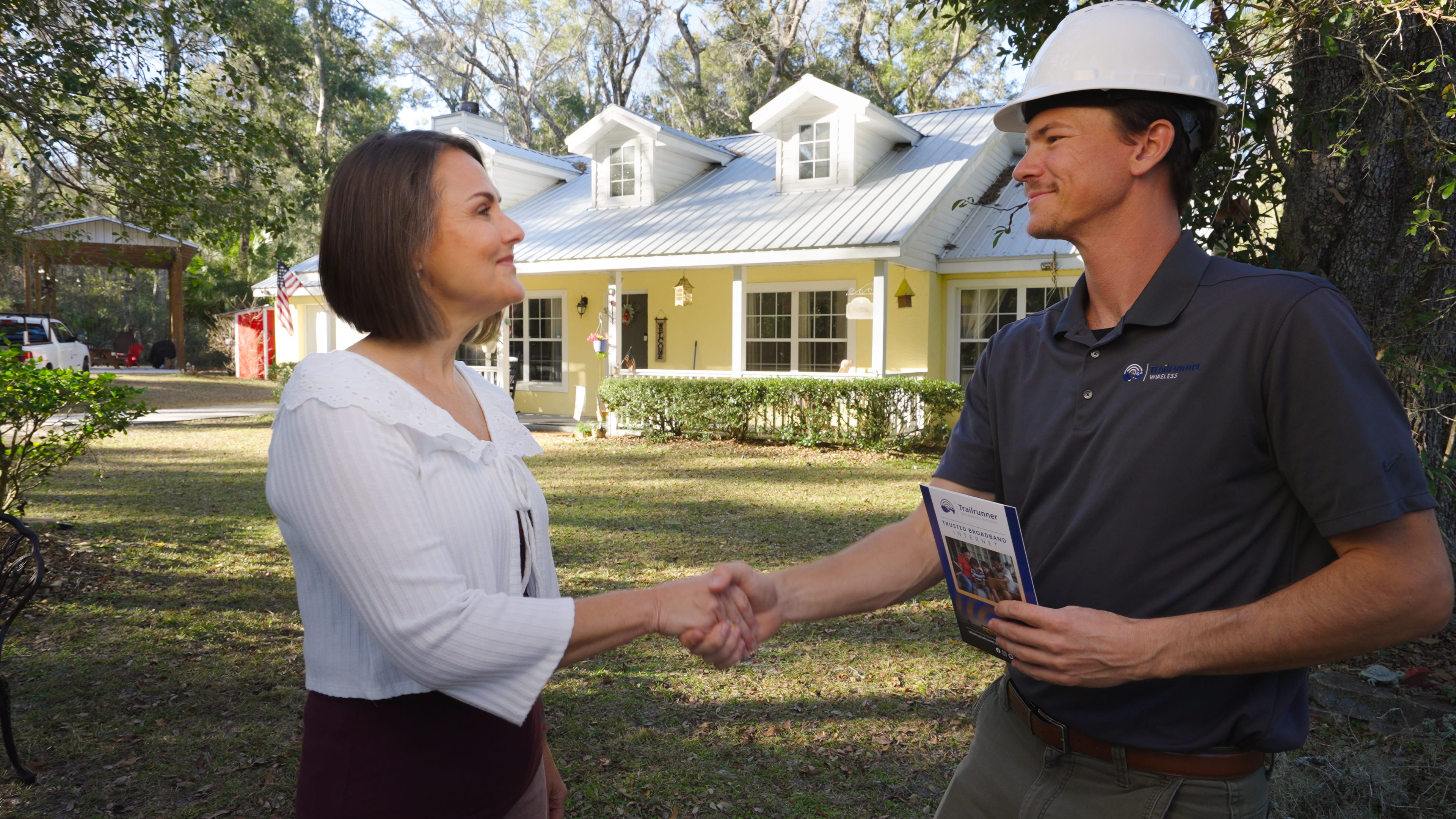 Trailrunner technician meeting a customer at their home